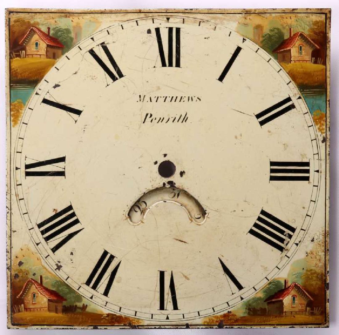 THREE EARLY 19TH C. PAINTED SHEET IRON CLOCK DIALS: A group of three hand painted dials from English grandfather clocks, circa 1825. One with hand painted vignettes of cottages at the spandrels, one with a lady of the period seated on a sofa above the