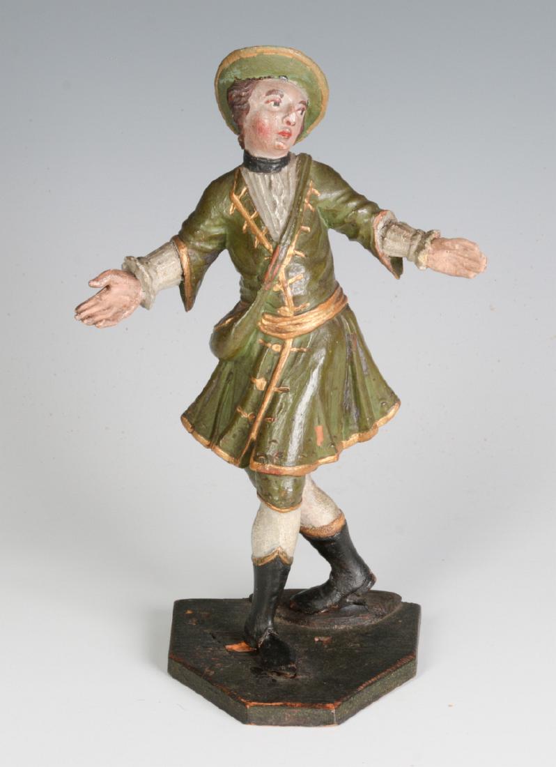 A 19TH C. CONTINENTAL CARVED AND PAINTED FIGURE (1 of 8)