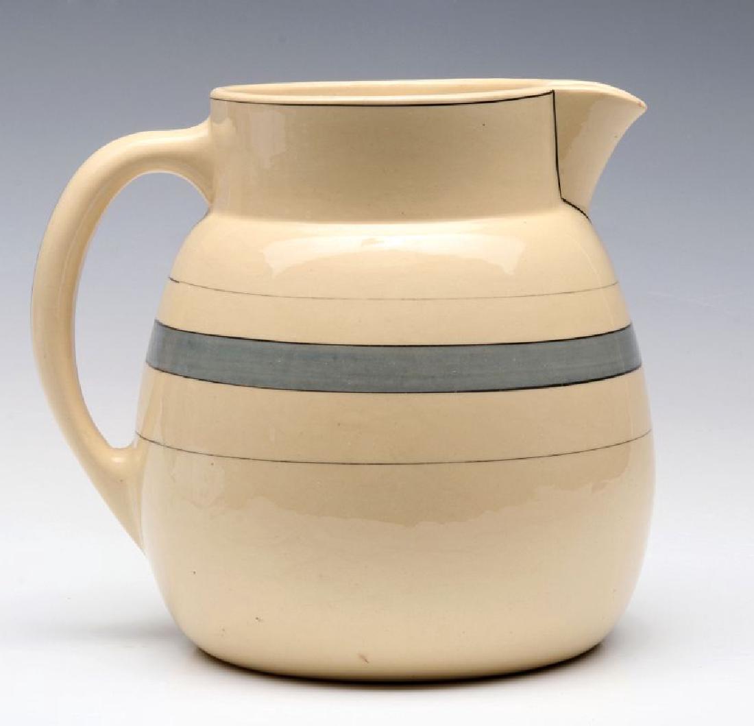 AN EARLY ROSEVILLE POTTERY PITCHER (1 of 9)