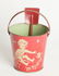 A TIN LITHO CHILD'S SAND PAIL AND SHOVEL