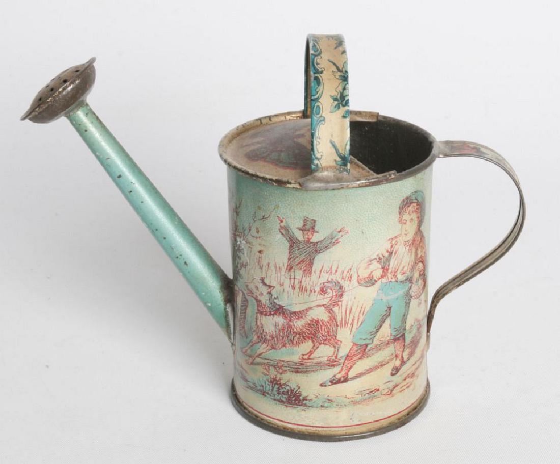 A VICTORIAN CHILD'S TIN LITHO WATERING CAN (1 of 9)