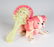 A VINTAGE CELLULOID RATTLE AND DOG FIGURE