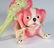 A VINTAGE CELLULOID RATTLE AND DOG FIGURE - 2