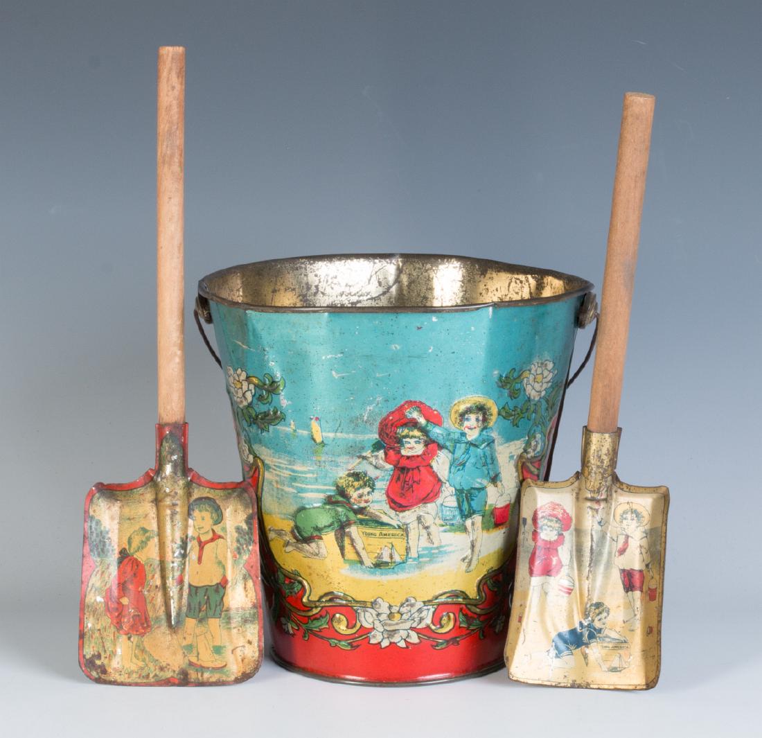 A 19TH CENTURY VICTORIAN SAND PAIL AND TWO SHOVELS (1 of 5)