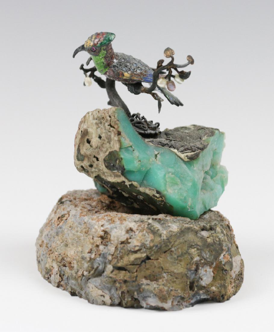 A SMALL EMBELLISHED BRONZE FIGURE ON GEODE (1 of 8)