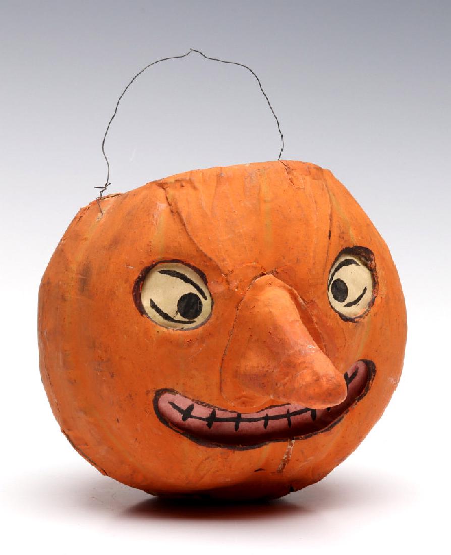 A GERMAN PAPIER MACHE HALLOWEEN JACKOLANTERN