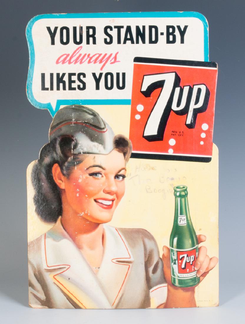 A WORLD WAR II DIE-CUT EASEL BACK 7-UP SIGN (1 of 6)