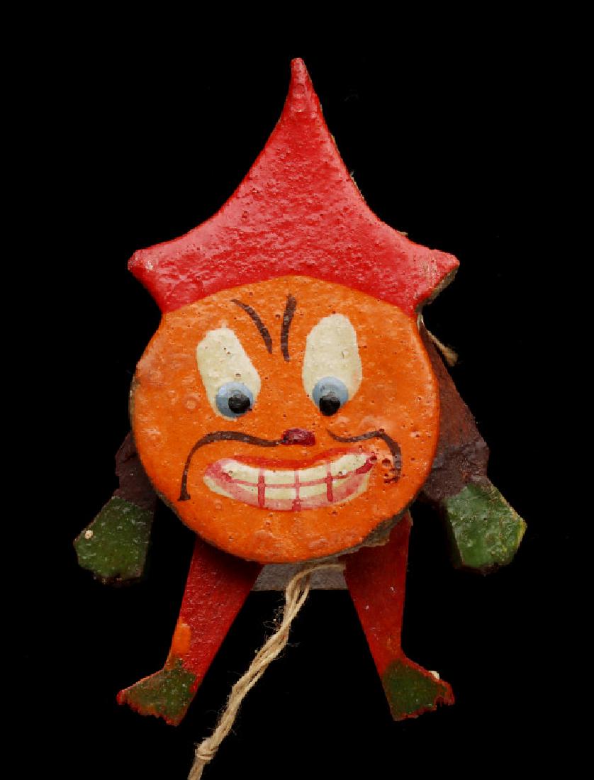 A SMALL ARTICULATED PAINTED WOOD HALLOWEEN TOY (1 of 11)