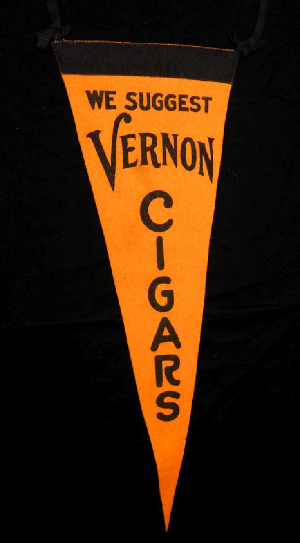 CIRCA 1900 ADVERTISING PENNANT FOR VERNON CIGARS: Black paints applied to yellow felt. Measures 27.75 inches. We happily provide seamless in-house packing and shipping services on nearly everything we sell.