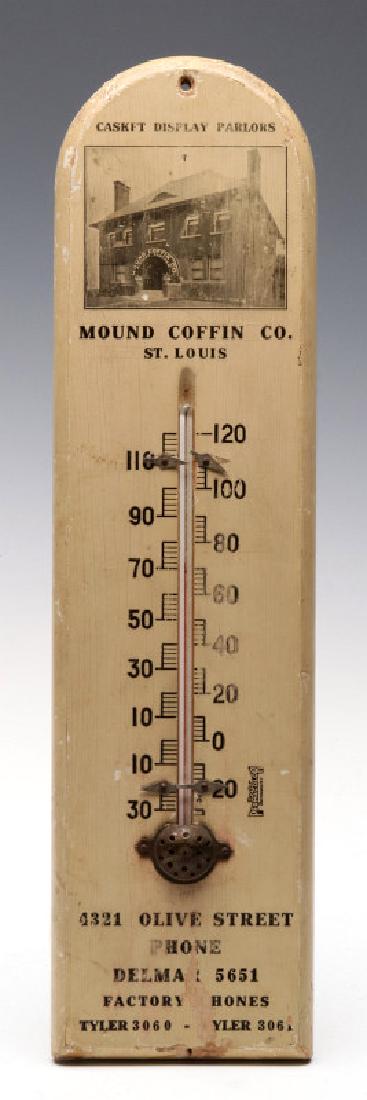MOUND COFFIN CO ST. LOUIS MISSOURI THERMOMETER: A painted wood advertising thermometer, pictures a company 'Casket Display Parlor', circa 1930s. Measures 15 x 4 inches. We happily provide seamless in-house packing and shipping services on nearly ev