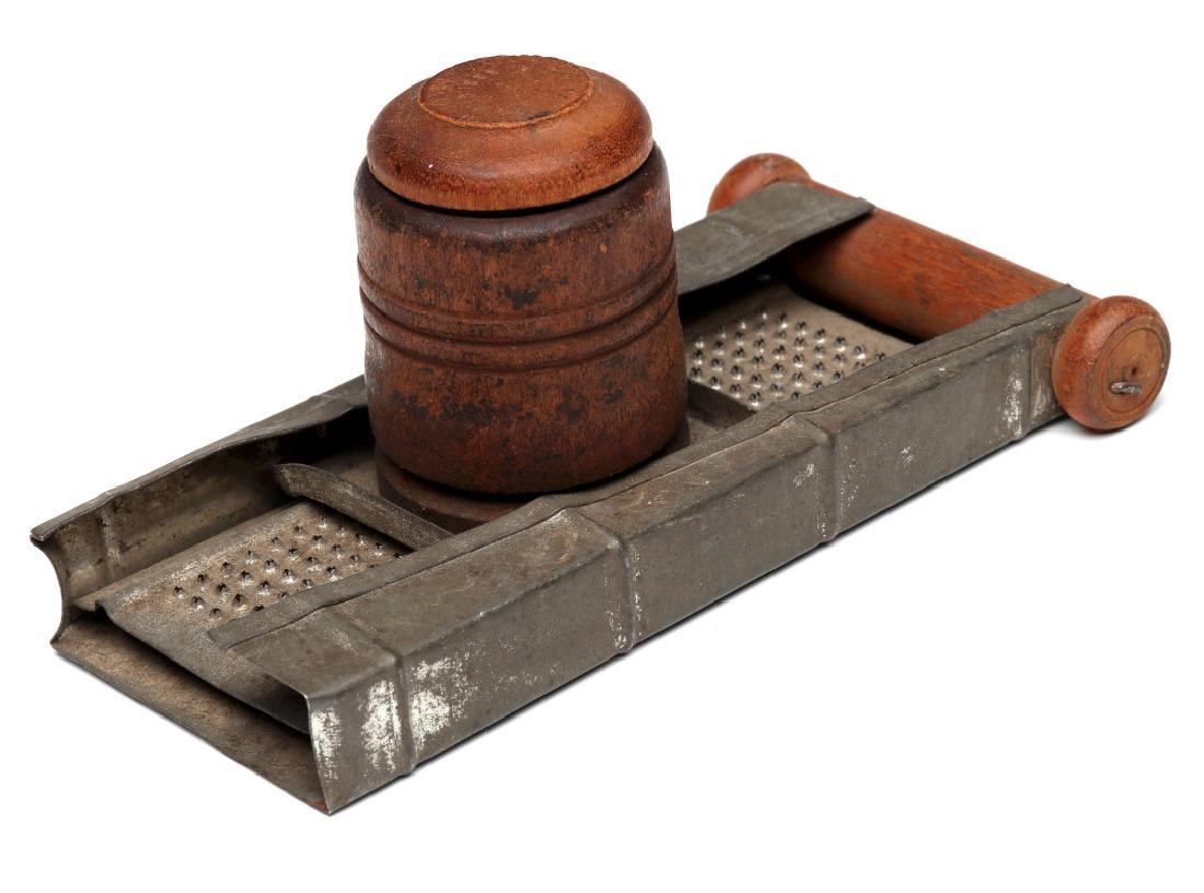 AN ANTIQUE NUTMEG GRATER (1 of 6)