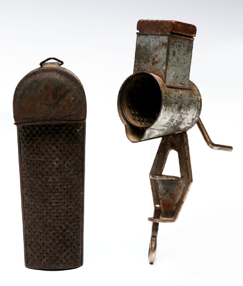 TWO ANTIQUE NUTMEG GRATERS: Examples in tin, unmarked. Grinder measures 6.25 x 2.25 inches . Grater measures 5.25 x 1.75 inches. We happily provide seamless in-house packing and shipping services on nearly everything we sell.