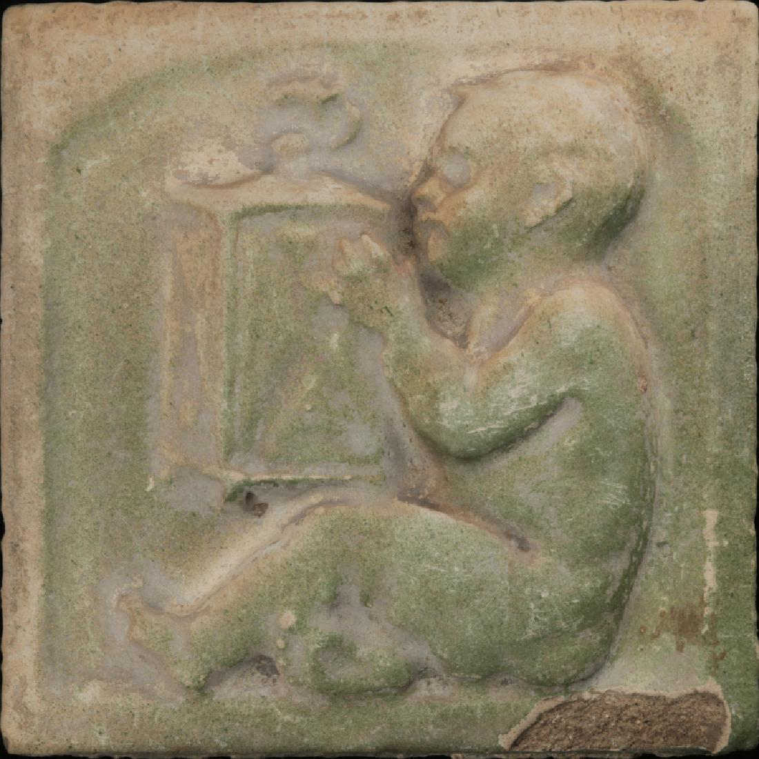 A GREEN MATTE TERRA COTTA RELIEF TILE CIRCA 1890 (1 of 4)