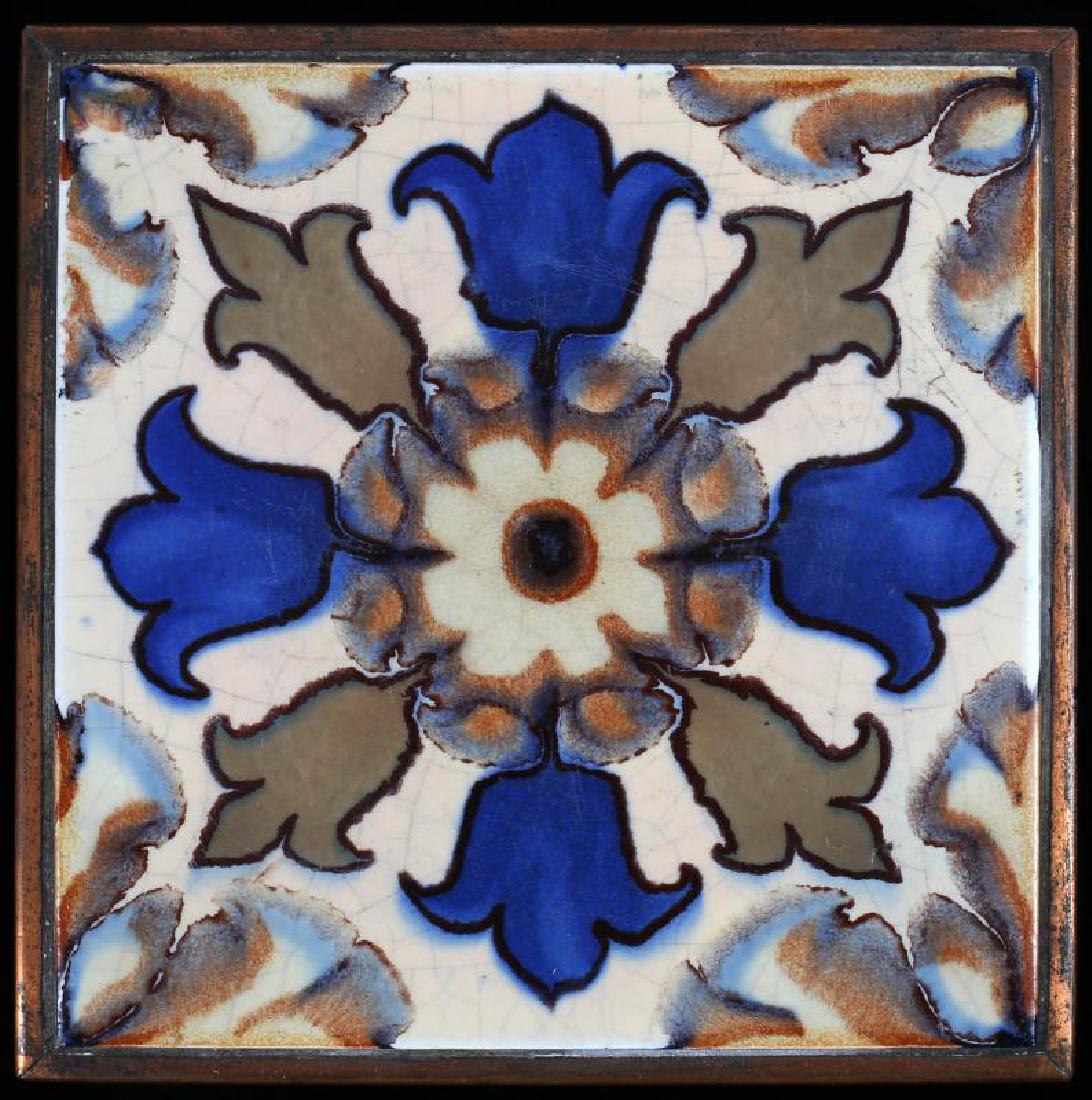 AN EARLY 20TH C. ART TILE W/ INTERESTING GLAZES: The primary crackle glaze flowed with multi-color glazes, some with a resist effect, set in a copper frame with backing. Measures 6.5 x 6.5. We happily provide seamless in-house packing and shipping s