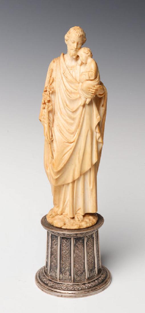A CARVED FIGURE OF ST JOSEPH ON PORTUGUESE SILVER (1 of 12)