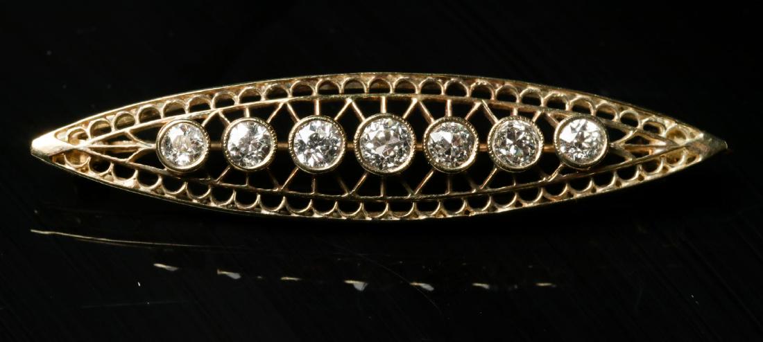 AN ANTIQUE 14K GOLD AND DIAMOND BAR PIN (1 of 7)
