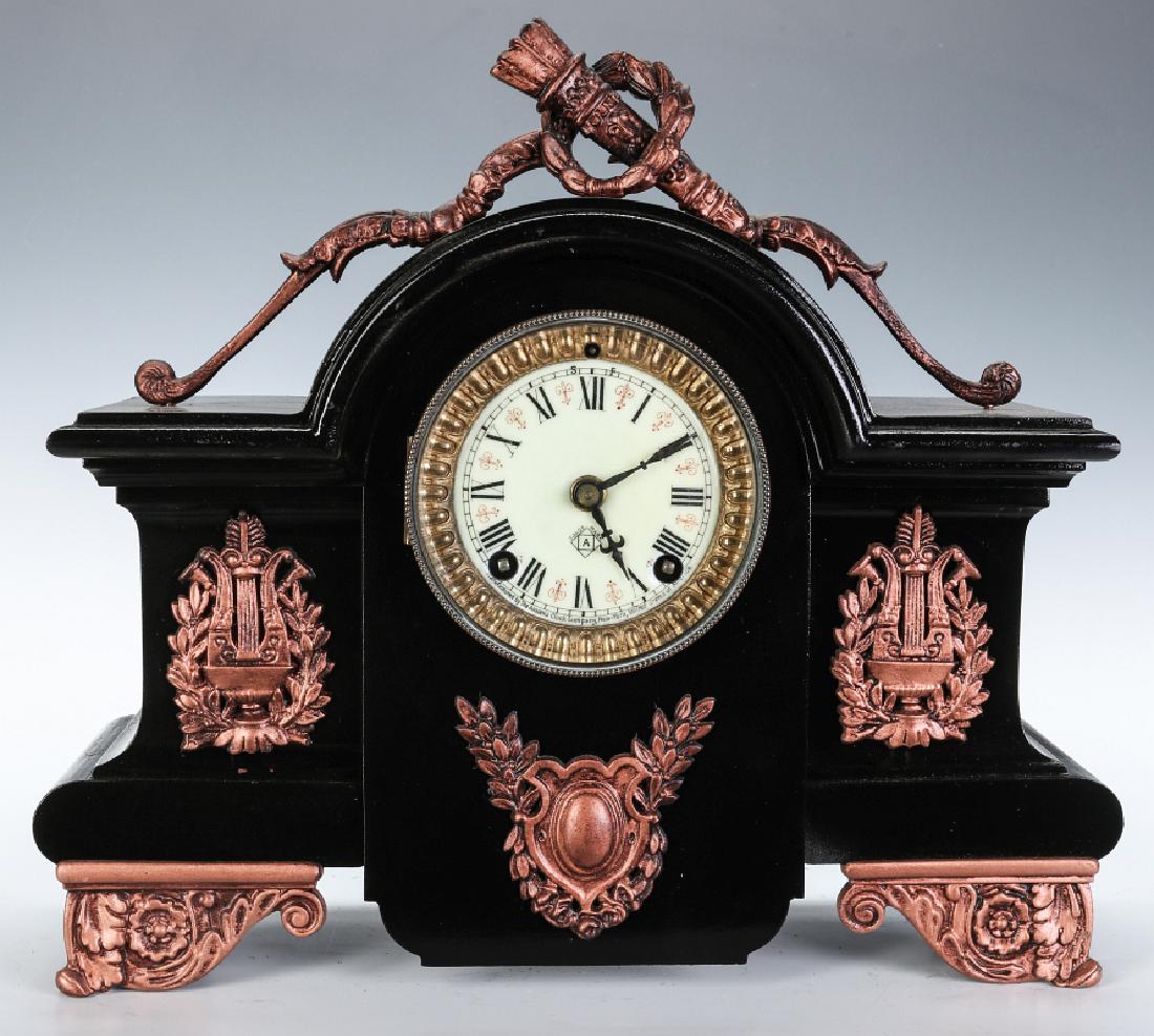 AN ANSONIA BLACK ENAMEL IRON MANTLE CLOCK (1 of 14)