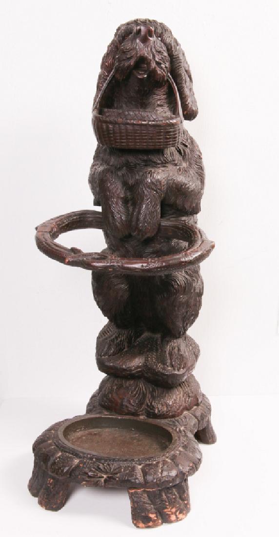 AN EARLY 20TH C BLACK FOREST CARVED DOG CANE STAND (1 of 14)