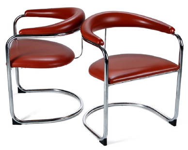 A PAIR ANTON LORENZ CANTILEVER CHAIRS FOR THONET: Tubular chromed steel frames with vinyl covering. Measures 28.5 x 23 x 21 inches. We happily provide seamless in-house packing and shipping services on nearly everything we sell.