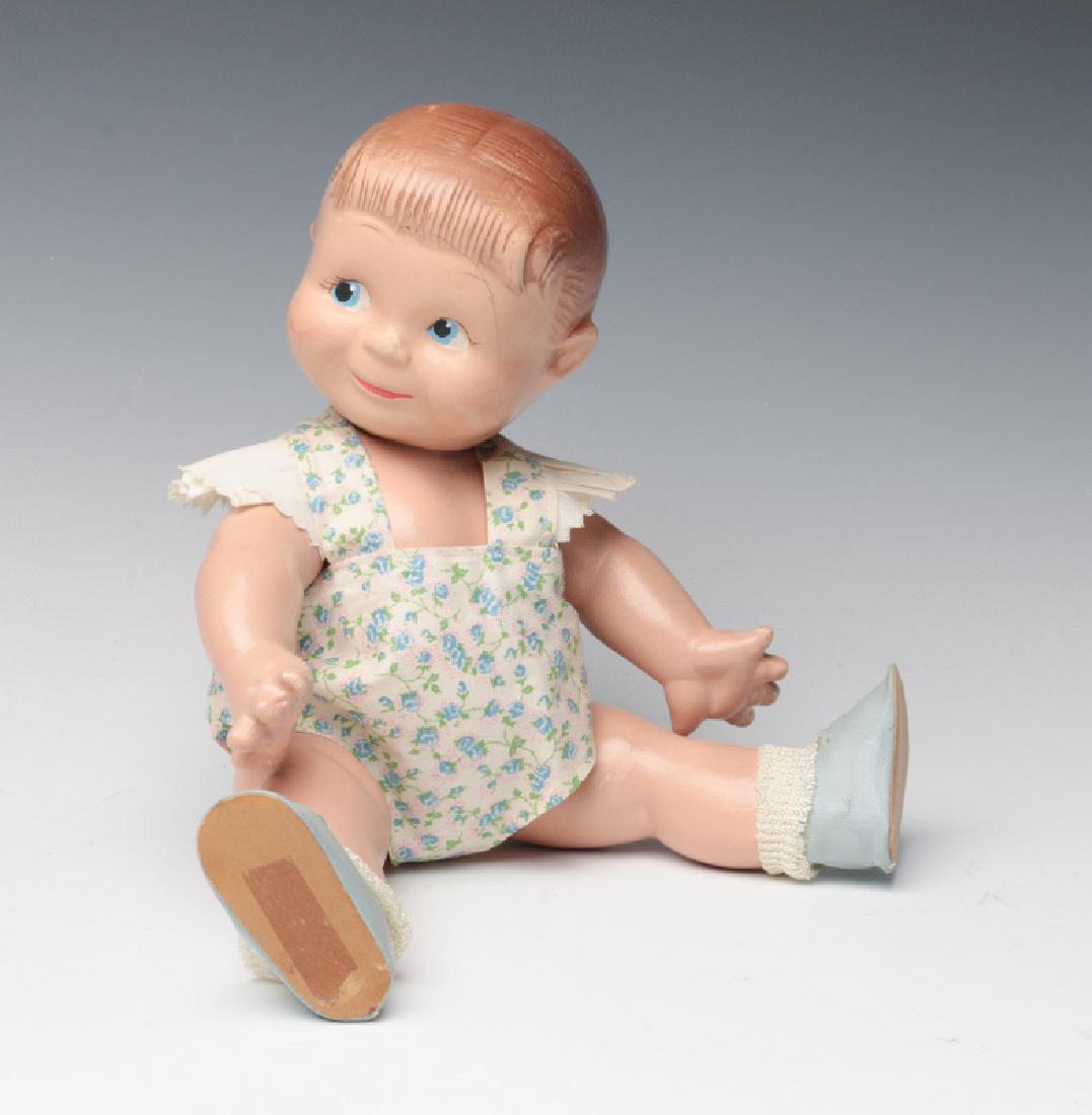 AN EARLY 20TH CENTURY COMPOSITION TODDLER DOLL (1 of 9)
