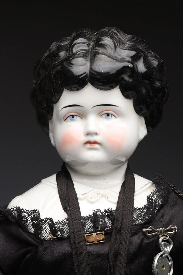A 19TH CENTURY GERMAN CHINA HEAD DOLL (1 of 12)