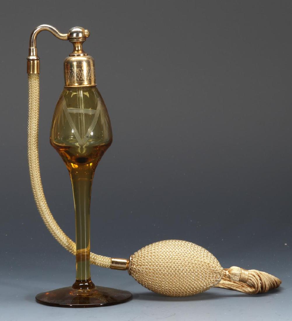 A VINTAGE ENGRAVED AMBER GLASS PERFUME ATOMIZER (1 of 6)