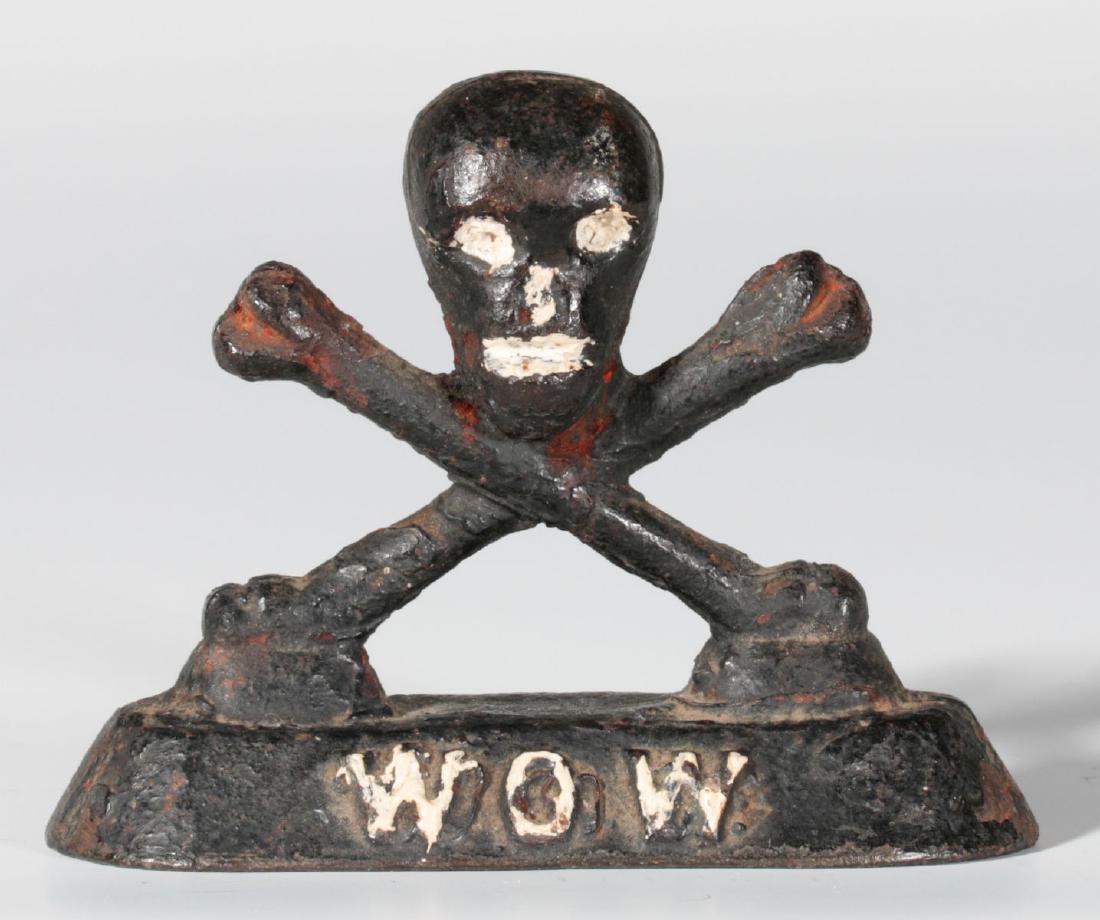 AN IRON SKULL & CROSSBONES FRATERNAL PAPERWEIGHT (1 of 7)