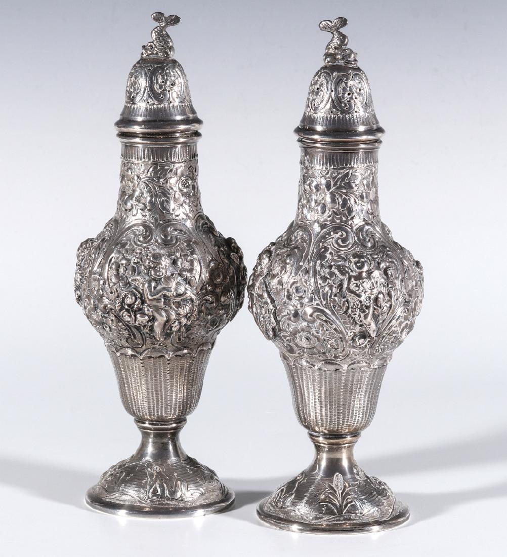 A PAIR CONTINENTAL SILVER REPOUSSE CASTORS (1 of 14)