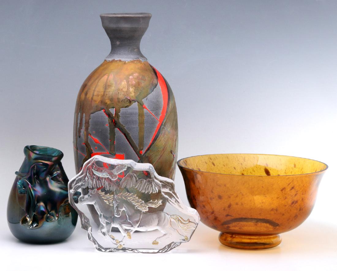 A NUMBER OF MODERN GLASS AND POTTERY PIECES: A globular iridescent purple glass vase with signature Schneider made by an electric engraver, a raku vase signed Mandette, crystal with horses, amber fleck bowl. Sizes range from 5 x 4 to 12 x 5 inch