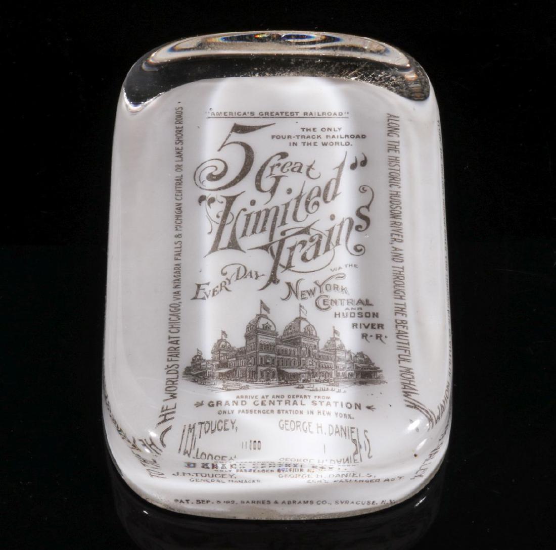 A NEW YORK CENTRAL WORLD'S FAIR GLASS PAPERWEIGHT (1 of 6)