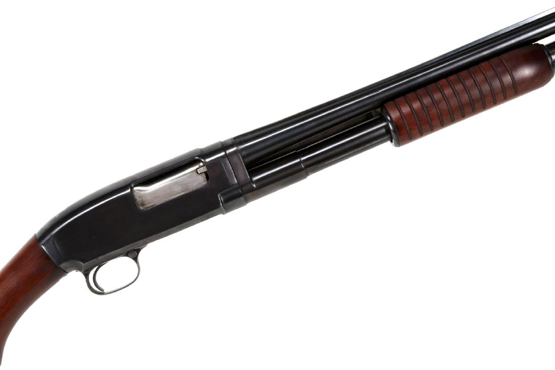 WINCHESTER MODEL 1912 PUMP 20GA: Winchester 20 gauge 12 (serial #:37600) Early manufacture. Mod choke solid rib barrel, blue finish, wood stock. White Line pad from Pachmayr. Measures 23 inch barrel, 42.5 inches overall. We will abid