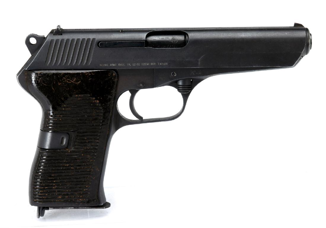 INTRAC ARMS CZ52 SEMI-AUTO 7.62X25 PISTOL, CZECH M: Intrac Arms 7.62x25 CZ52 (serial #:C10029) Manufactured 1952â€“1954, 'rid' marking indicating military manufacture, blued finish, plastic grips, fixed front and rear sights, one magazine. Measure