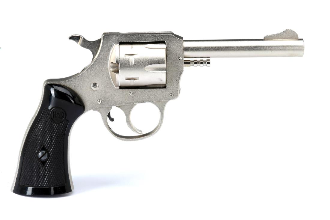 H & R MODEL 622 REVOLVER .22LR: H & R INC .22 622 (serial #:AC69546) Manufactured 1966. Double-action with 6-shot pull pin cylinder, brushed steel finish, fixed front and rear sights, plastic grips with H&R logo. Measures 4 inch bar