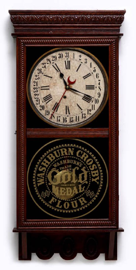 AN E. INGRAHAM REGULATOR ADVERTISING WALL CLOCK