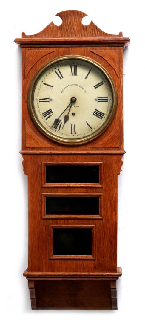 A PRENTISS CALENDAR & TIME CO. WALL CLOCK AS FOUND: The Calendar movement is missing, but would typically display in the three rectangular windows through the front. Oak case, painted dial with Roman numerals and company signature, time only (no strike