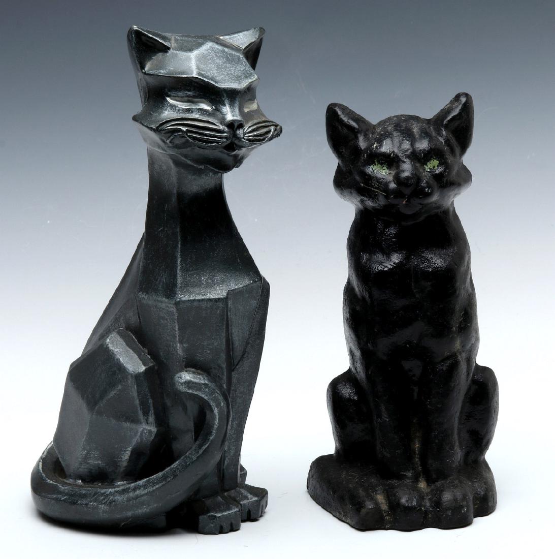 TWO MID-20TH CENTURY CAT DOORSTOPS: A Kleistone hard rubber black cat doorstop, polychrome paint, single-sided, signed with a decal on the back. Plus a 1961 Universal Statuary Corp. composite Siamese cat in a modern, cubist style, signe