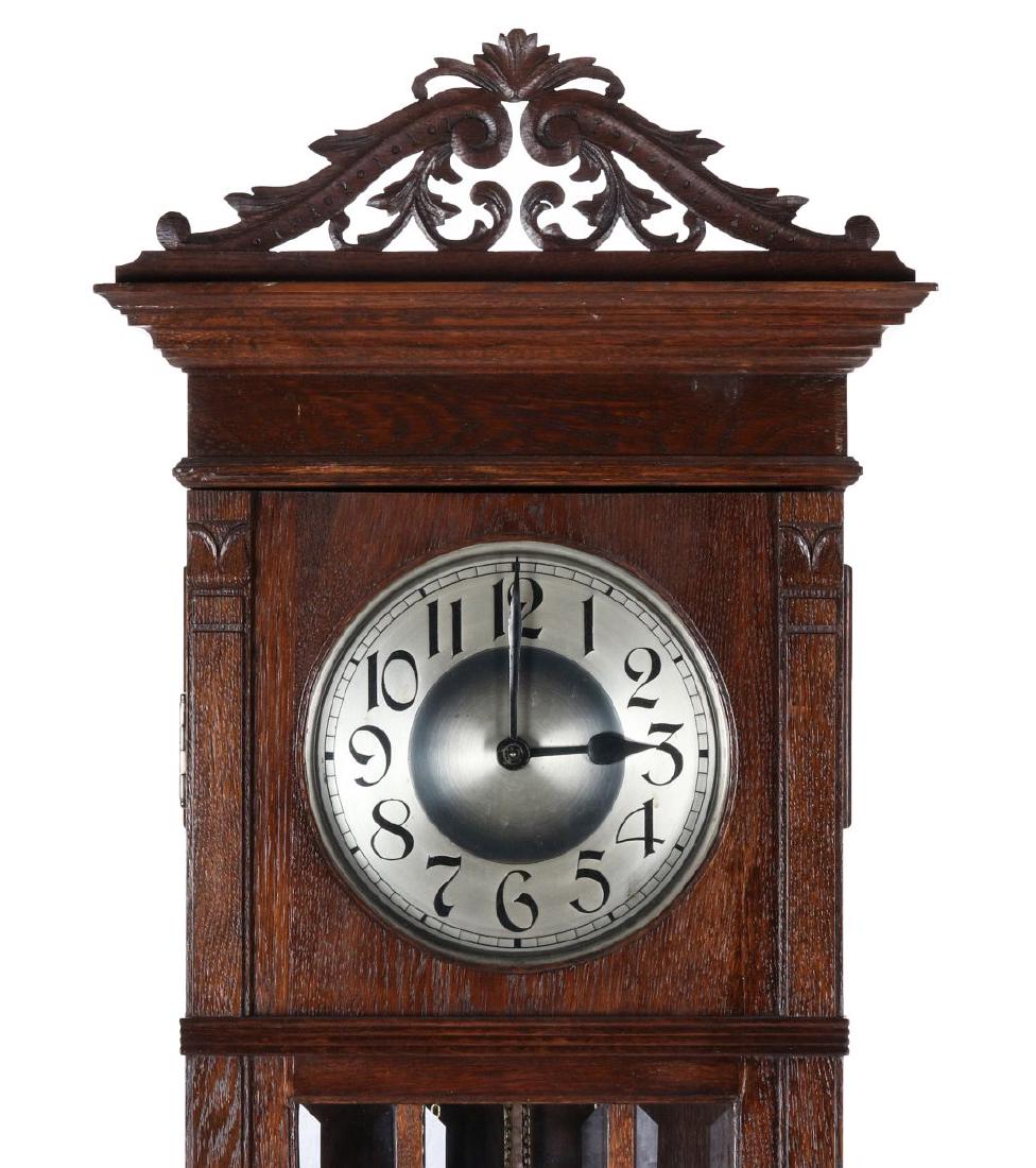 A HANDSOME GUSTAV BECKER OAK GRANDFATHER CLOCK