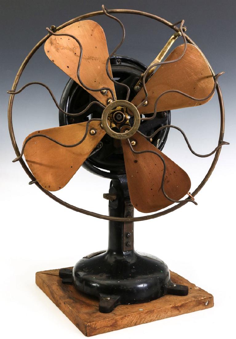 A MENOMINEE TAB-FOOT FAN, CIRCA 1912 (1 of 13)