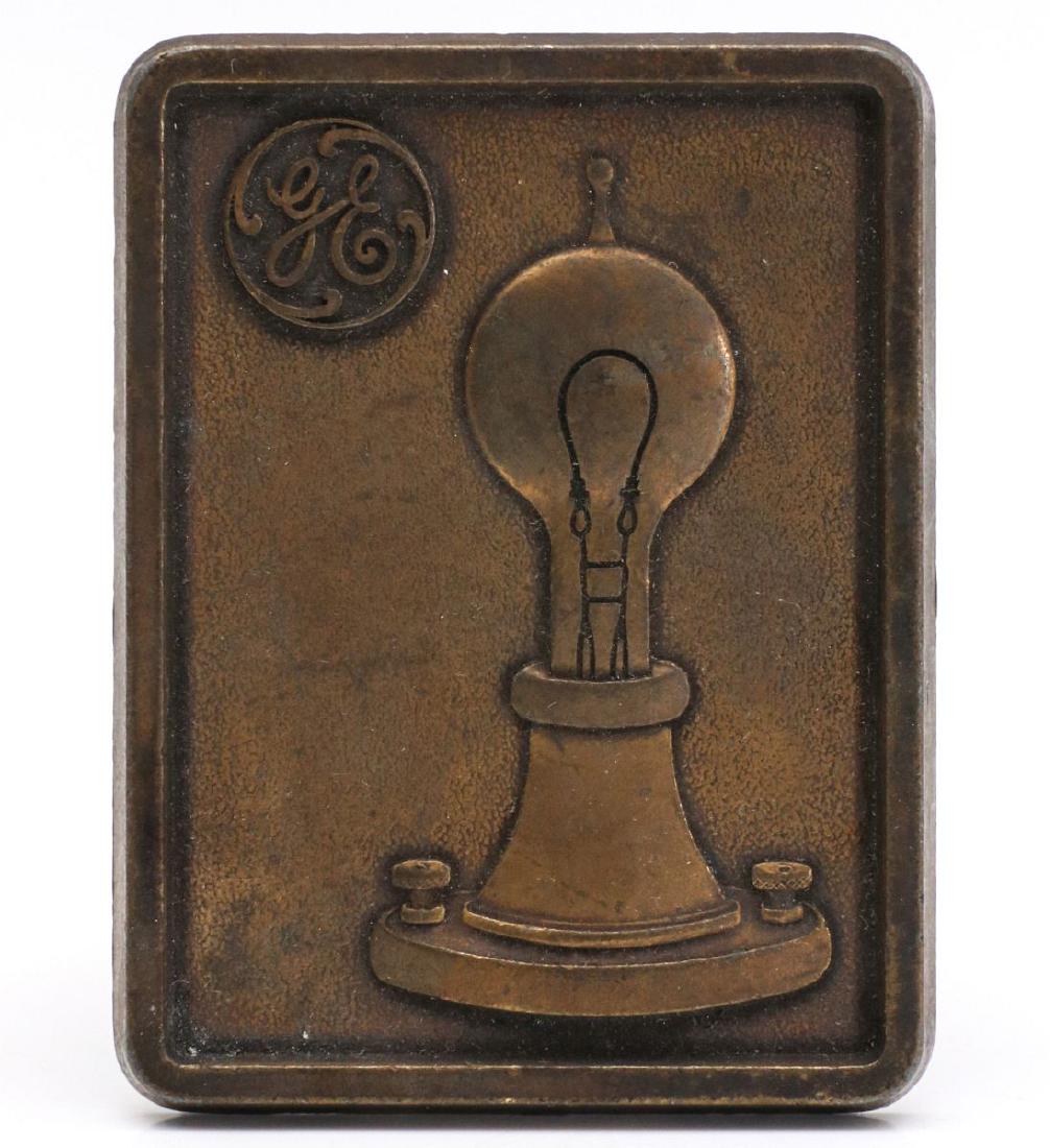 A GENERAL ELECTRIC BRASS ADVTG PAPERWEIGHT C 1920 (1 of 4)