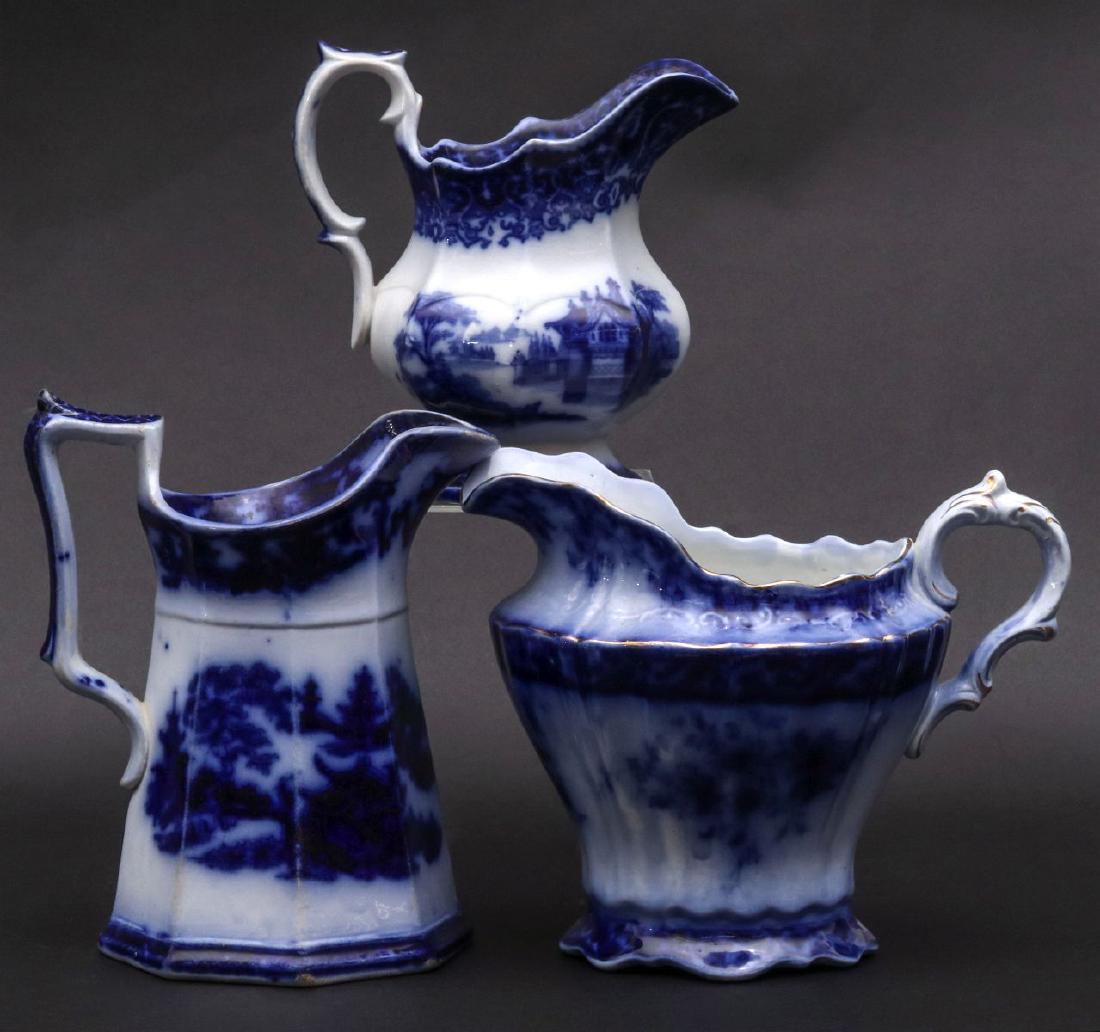 TONQUIN, TOURAINE AND ARABESQUE FLOW BLUE PITCHERS (1 of 12)