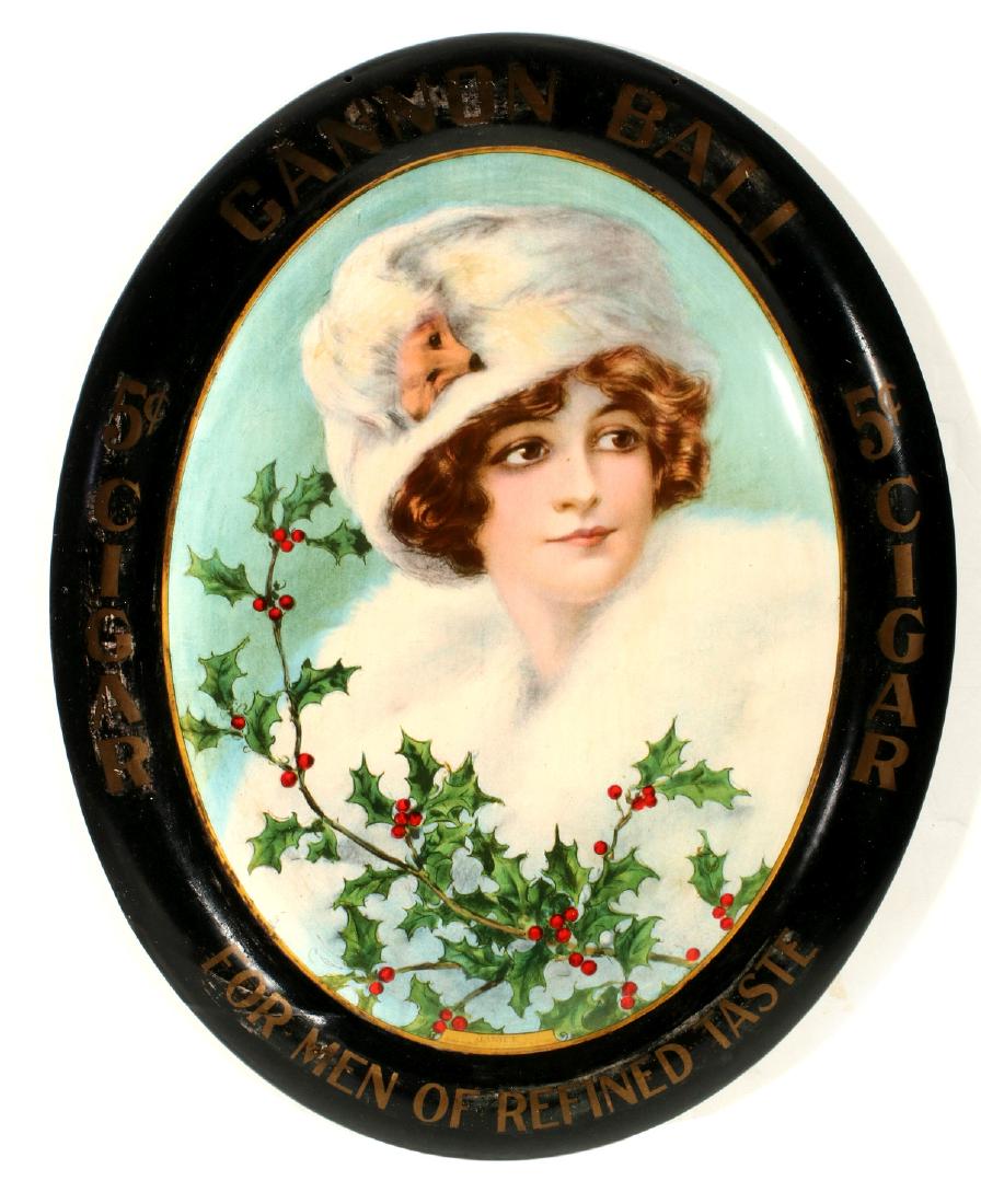 CANNON BALL 5¢ CIGARS SELF-FRAMED TIN SIGN 1913: The oval form self-framed, lithography on tin, pictures a beautiful maiden with Christmas Holly, titled JANICE, dated 1913 and lettered AMERICAN ART WORKS COSHOCTON OHIO - 134. Measures 17.5 x 14 inch