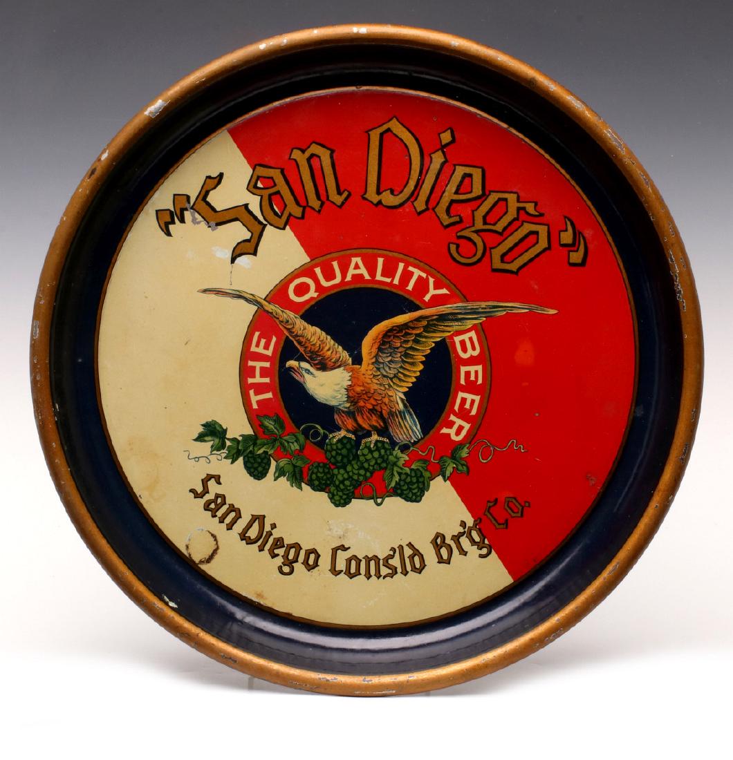 A PRE-PROHIBITION ADVTG TRAY FOR SAN DIEGO BREWING: The circular tray with lithographed tin graphics of a divided center half red and half white with bald eagle with hops and logo 'SAN DIEGO' THE QUALITY BEER, San Diego Cons'ld Br'g Co. Measures 13 inc