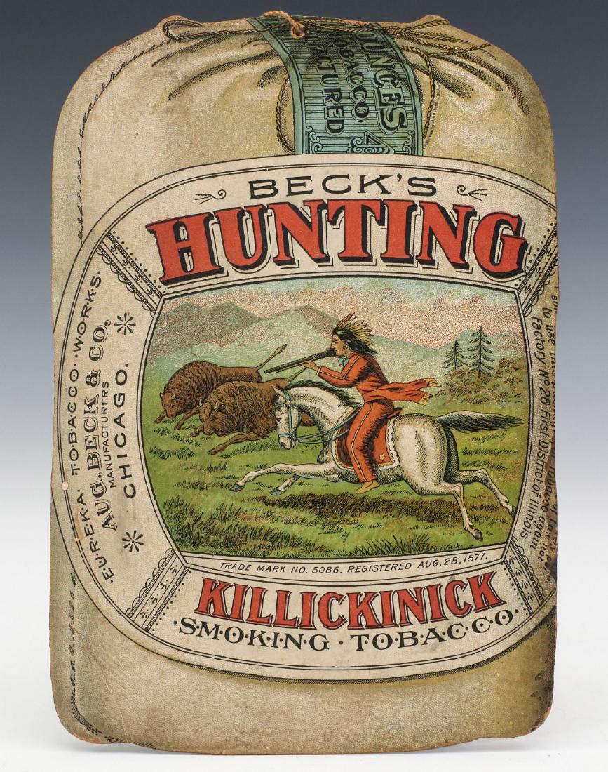 A BECK'S TOBACCO DIE CUT ADVERTISING SIGN C. 1880: The die-cut form of a tobacco package, chromolithograph cardstock advertisement with scene of native American hunting bison, the double-sided sign trademark Aug. 28, 1877. Measures 7.25 x 5 inches. We