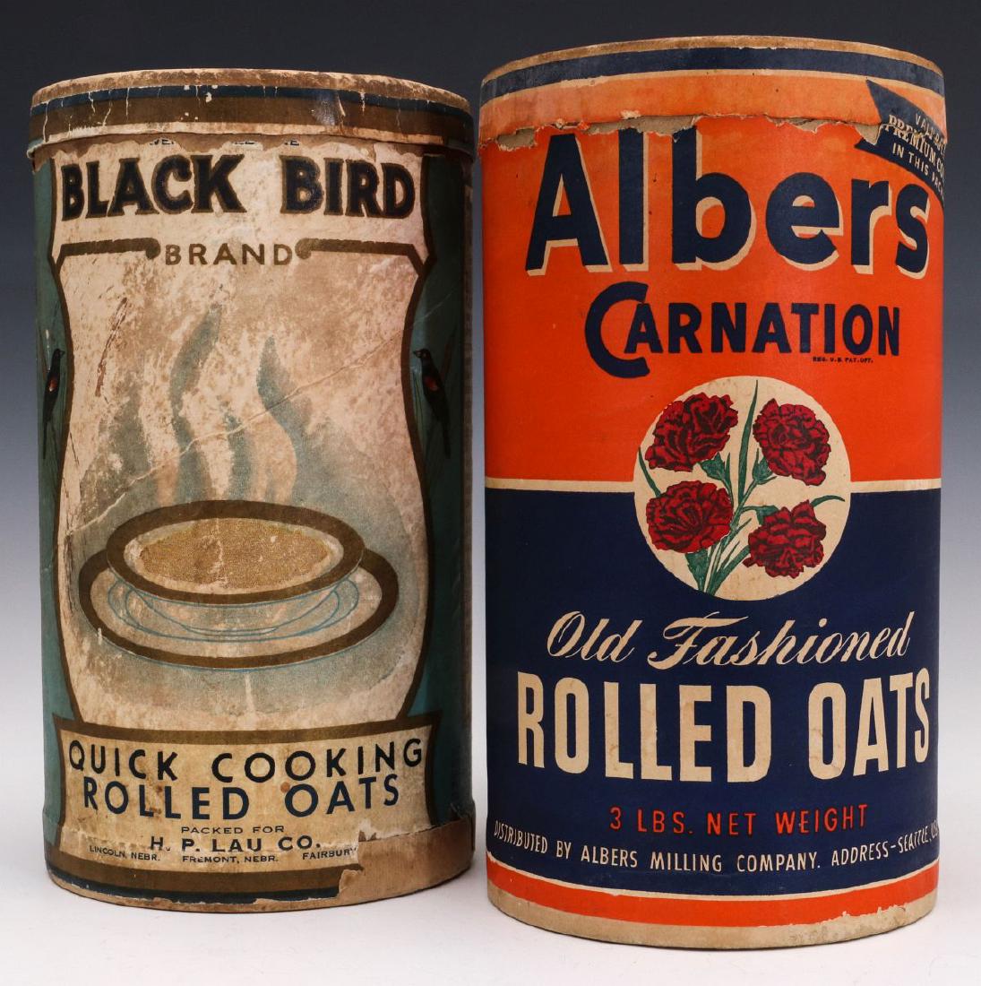 BLACK BIRD AND CARNATION BRAND OATMEAL CANISTERS: Black Bird Brand 'Packed for H.P. Lau Co.' of Nebraska and Albers Carnation Old Fashioned Rolled Oats, Seattle. Measure 9.5 x 5.5 inches each. We happily provide seamless in-house packing and shipping