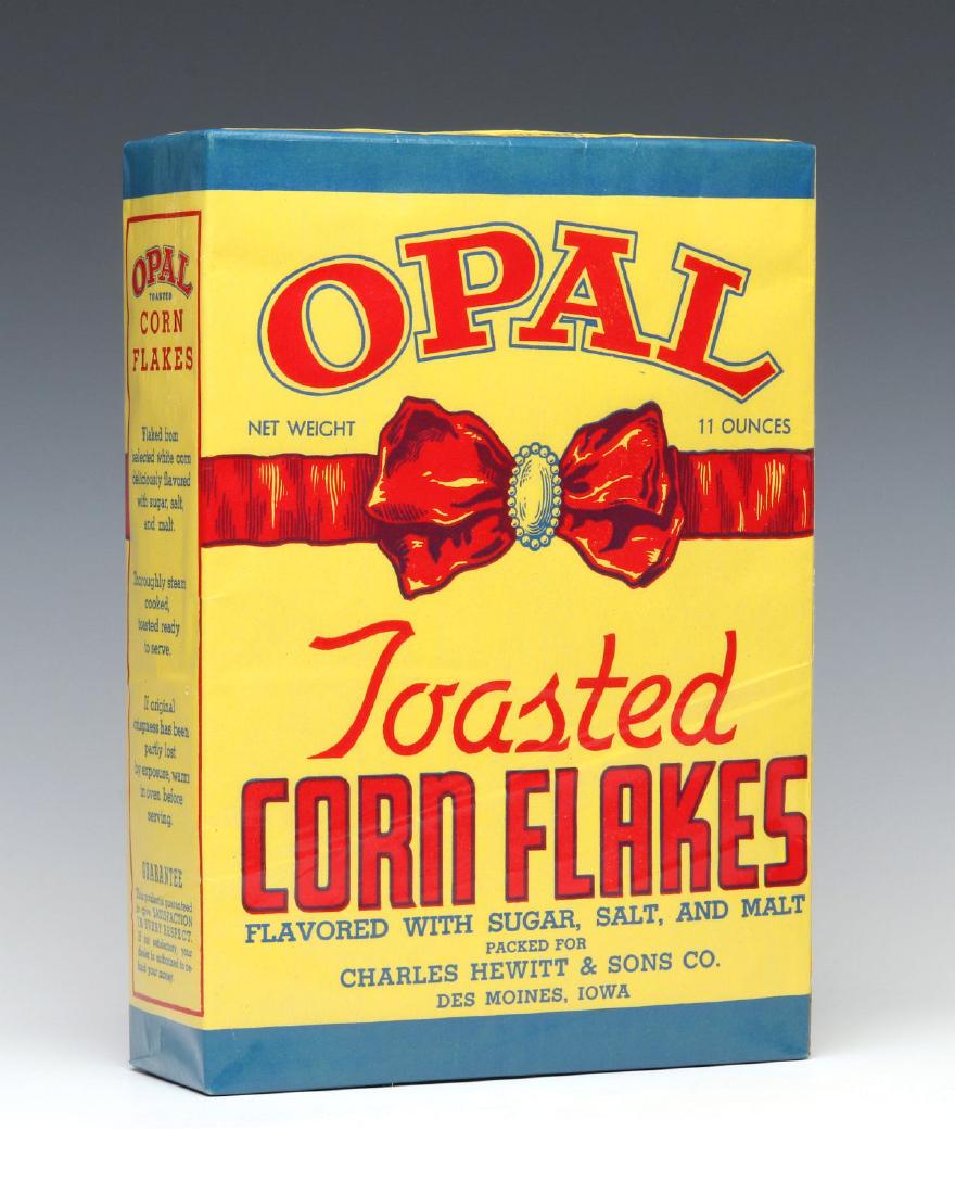 AN OPAL BRAND TOASTED CORN FLAKES CONTAINER: Opal and red bowl graphic plus PACKED FOR CHARLES HEWITT & SONS CO., DES MOINES, IOWA. Measures 10.75 x 7.5 x 2.75 inches. We happily provide seamless in-house packing and shipping services on nearly 