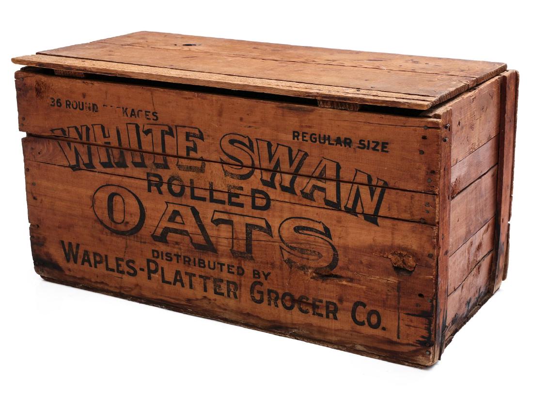 A WHITE SWAN ROLLED OATS WOOD ADVERTISING CRATE: The circa 1900 wood crate with black lettering. Measures 15 x 28 x 14.25 inches. We happily provide seamless in-house packing and shipping services on nearly everything we sell.