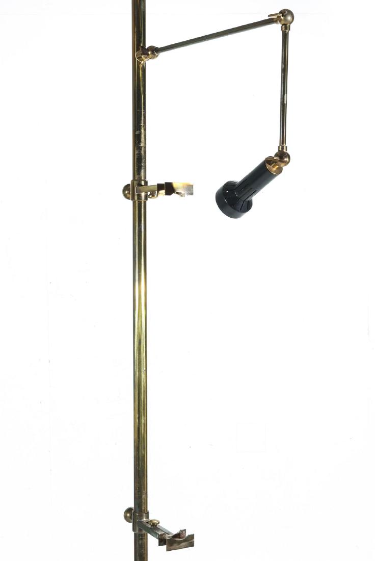 ANGELO LELLI LIGHTED EASEL FOR ARREDOLUCE C. 1960: A circa 1960 lacquered brass floor standing painting easel with light, designed by Italian designer/maker Angelo Lelli for Arredoluce Monza, Italy circa 1960, original label underside of the base. Mea