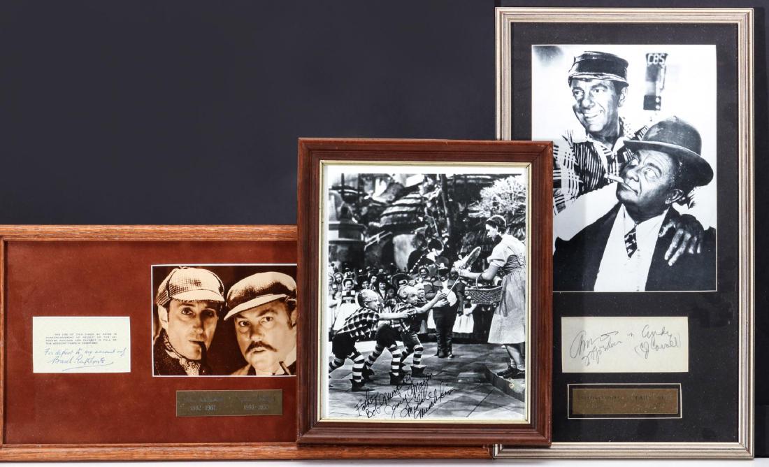 GOLDEN AGE OF HOLLYWOOD AUTOGRAPHS AND PHOTOS: Includes: Clipped signatures of actors Basil Rathbone and Nigel Bruce who portrayed Sherlock Holmes and Dr. Watson in films released between 1939 and 1946, framed with a studio photo of the actors; A 