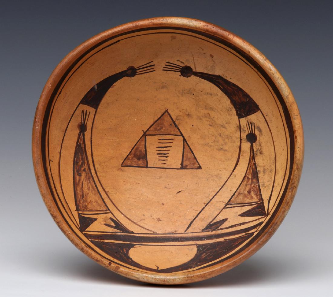A GOOD EARLY 20TH CENT HOPI POTTERY BASIN: The traditional buff ground with a simple, primitive design in brown slip. Measures 3.25 x 8.5 inches. We happily provide seamless in-house packing and shipping services on nearly everything we sell.