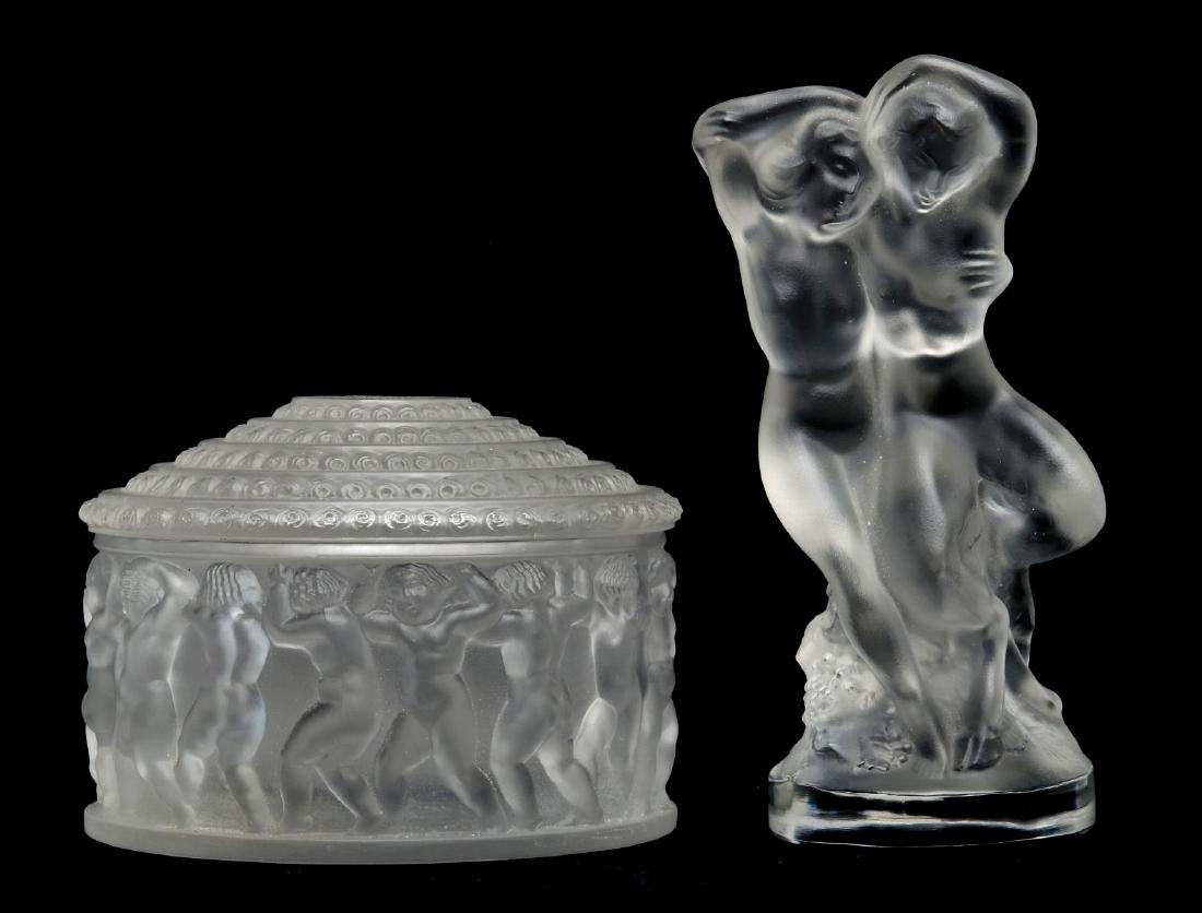 LALIQUE CRYSTAL BOX AND FIGURE GROUP: A Lalique 'Enfants' covered box signed with a foil sticker on the lid and etched signature on the base. Plus a Lalique 'Pan and Diana' frosted crystal group, signed with a foil sticker and etched sign